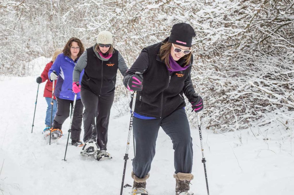 Women snowshoeing.